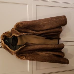 Faux fur coat with hood